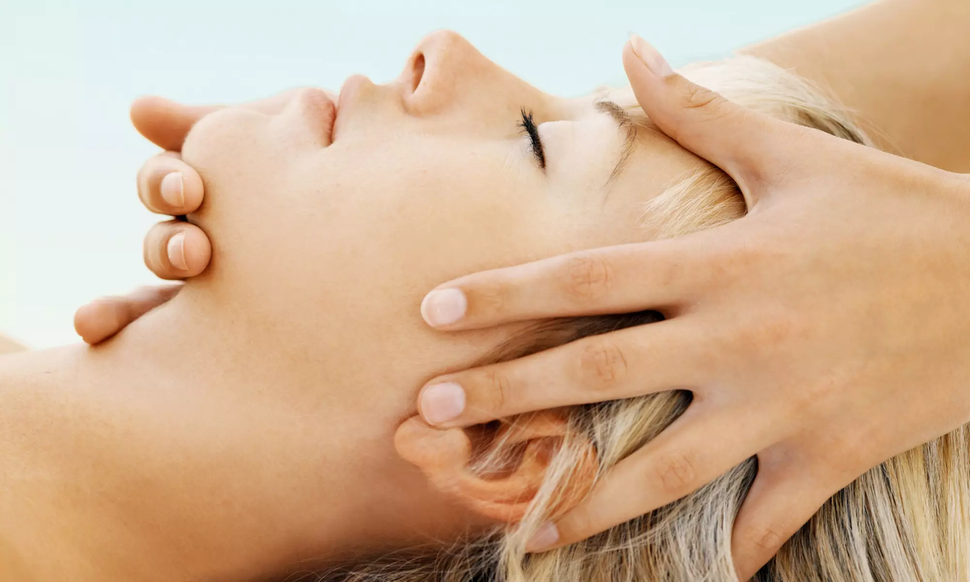 One-Hour Swedish Massage or Signature Facial at Hand & Stone Massage and Facial Spa (Up to 61% Off)  - Primary Image