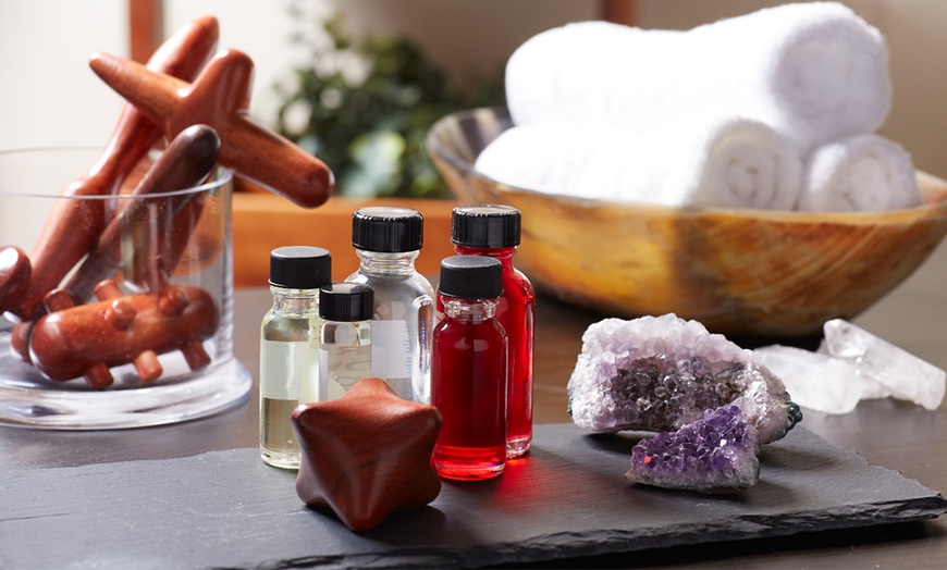 Image 3: 60- or 90-Min Massage & Facial Packages with Hot Stone or Aromatherapy