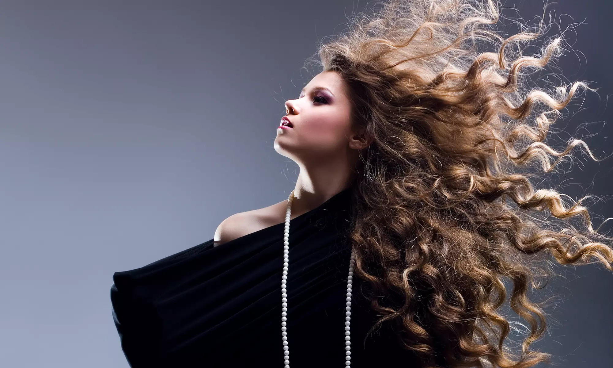 Haircut with Optional Color or Highlights at Zen Salon (Up to 55% Off) - Primary Image