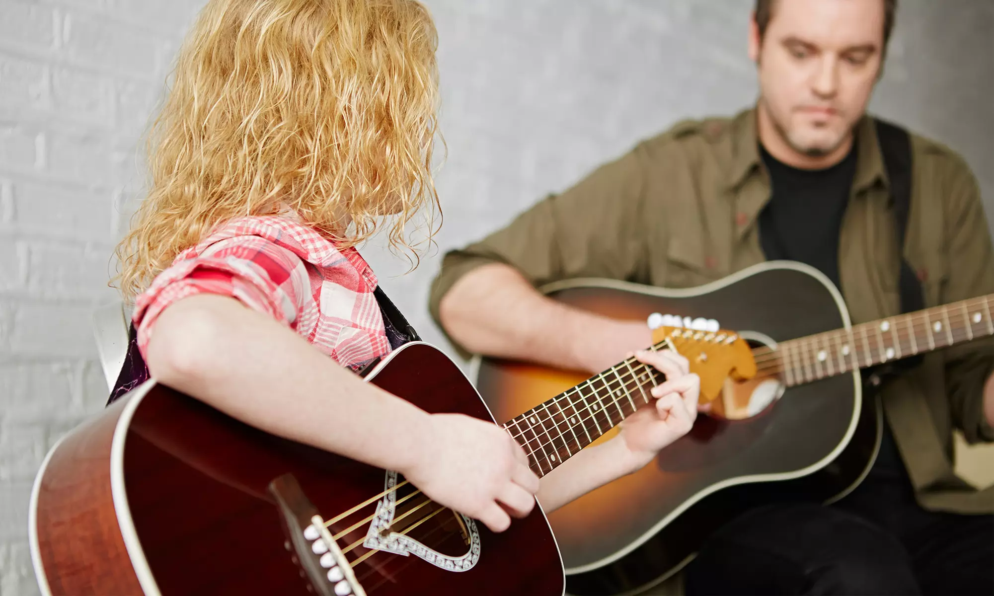 Two 60-Minute Group Lessons for Guitar or Ukulele at Maxwell's House of Music (Up to 50% Off) - Primary Image