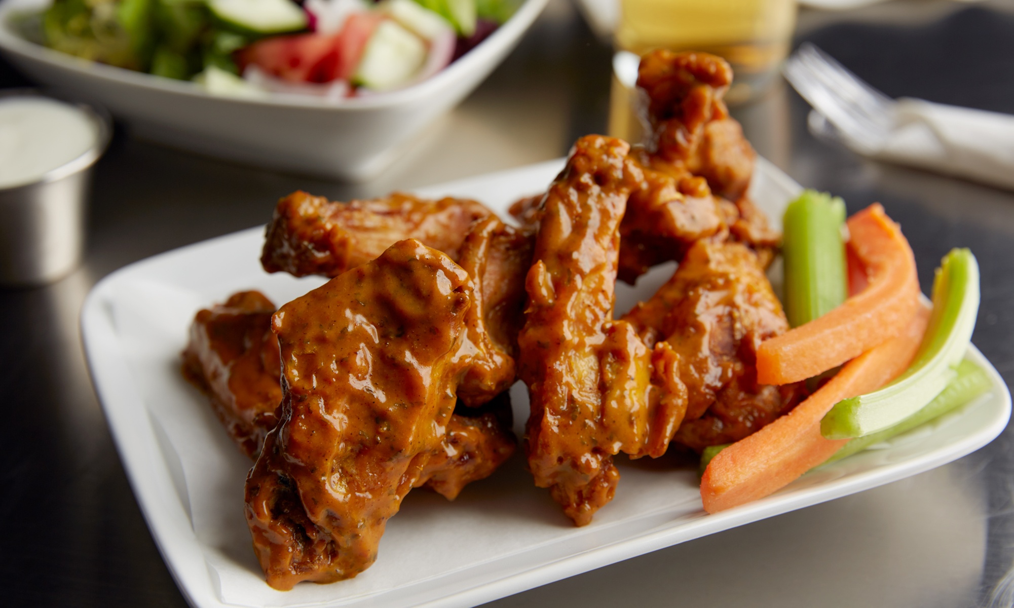 Single Wings with a Tall Can for the Perfect Pair