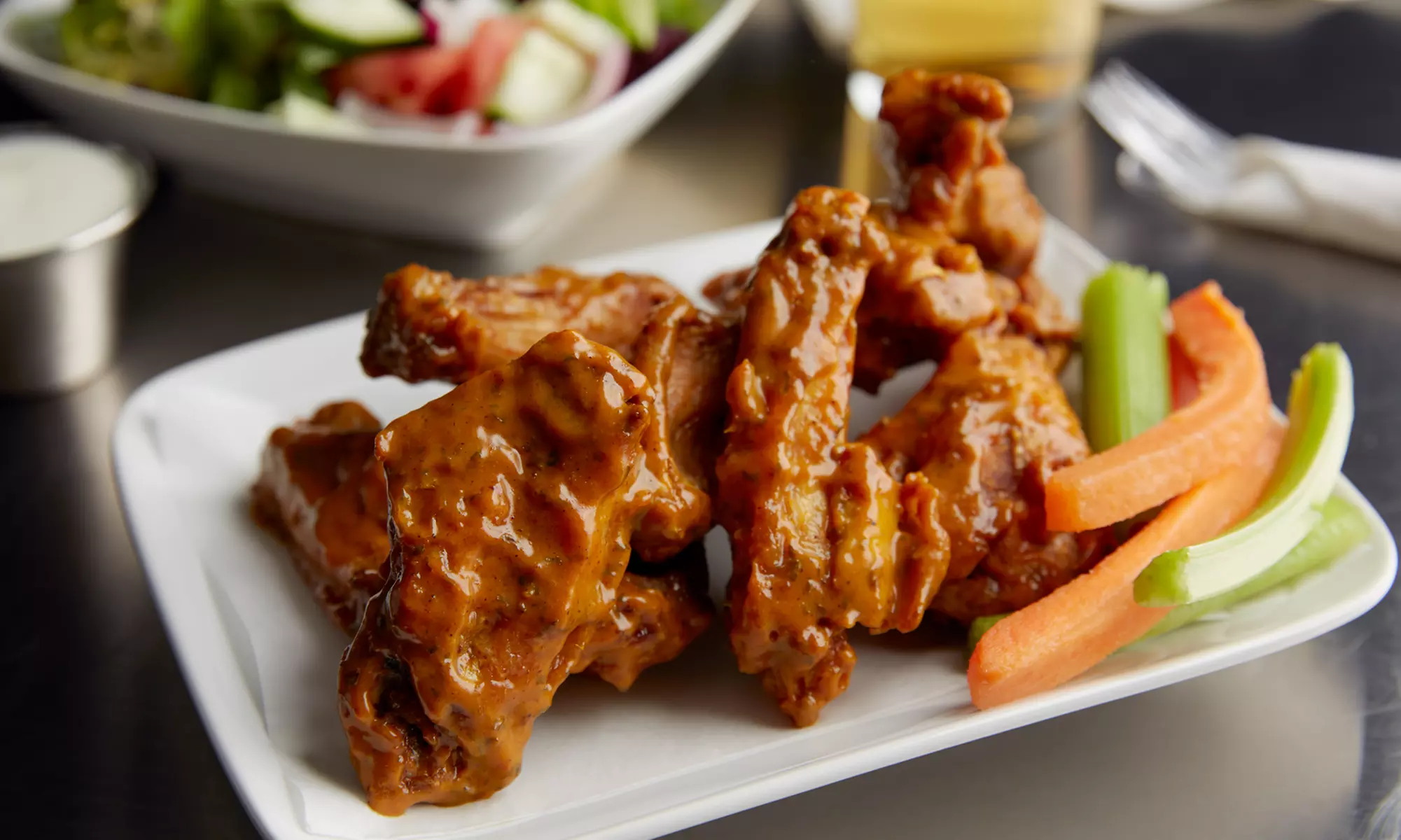 Single Wings with a Tall Can for the Perfect Pair at Wild Wing (Up to 20% Off) - Primary Image