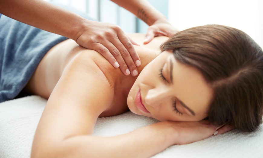 Image 1: 60-Minute Hot Stone Massage