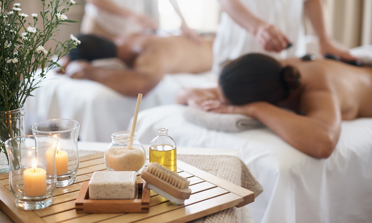 Single or Couples 60-Min Deluxe Body Massage w/ Hot stone treatment 