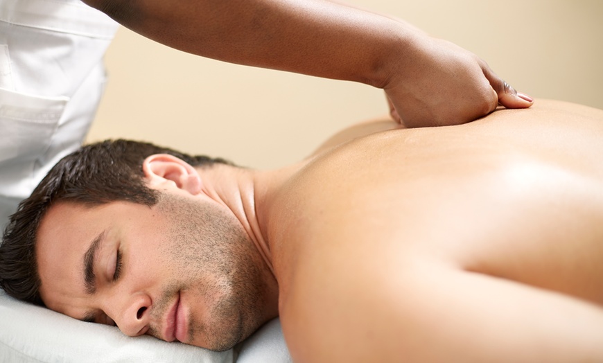Image 3: 30 or 60-Min Full-Body Massage with Hot Stones or Red Light Therapy
