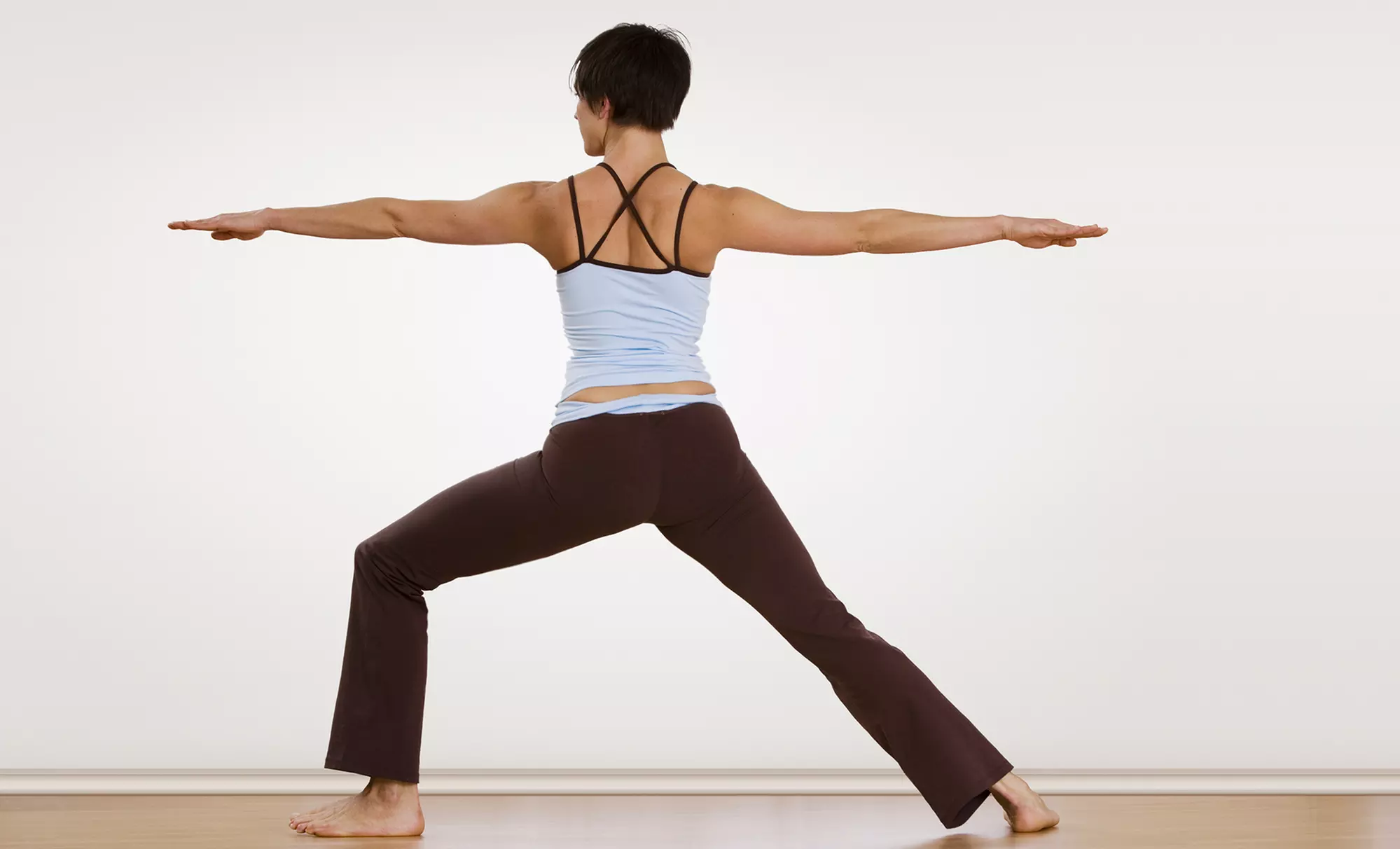 5 Yoga Classes, 15 Classes, or Month of Unlimited Classes with Yoga DVD and Gift at Taylor Yoga(Up to 62% Off) - Primary Image