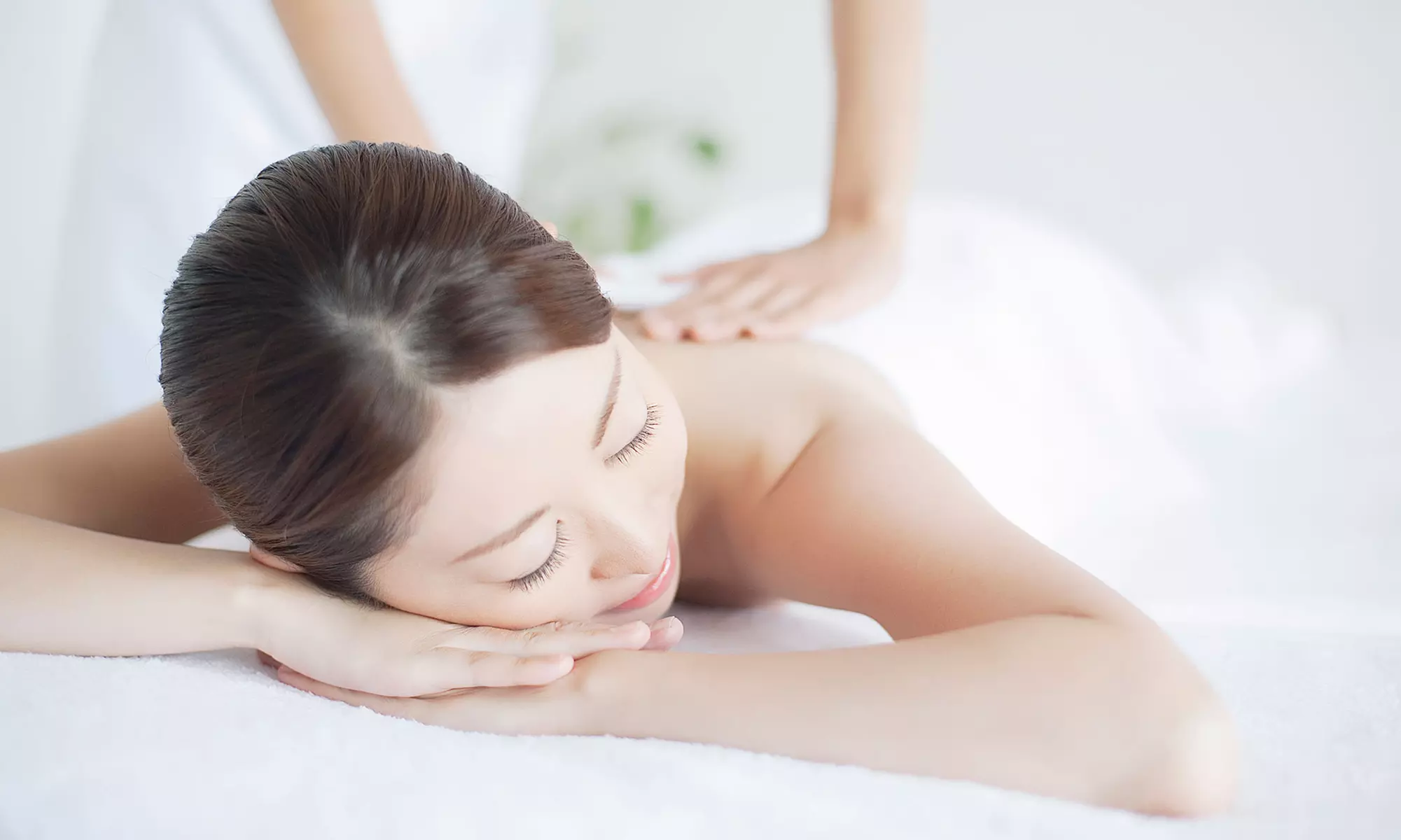 One-Hour Body Massage with Foot Massage or Facial at New Happy Day Spa (Up to 40% Off) - Primary Image