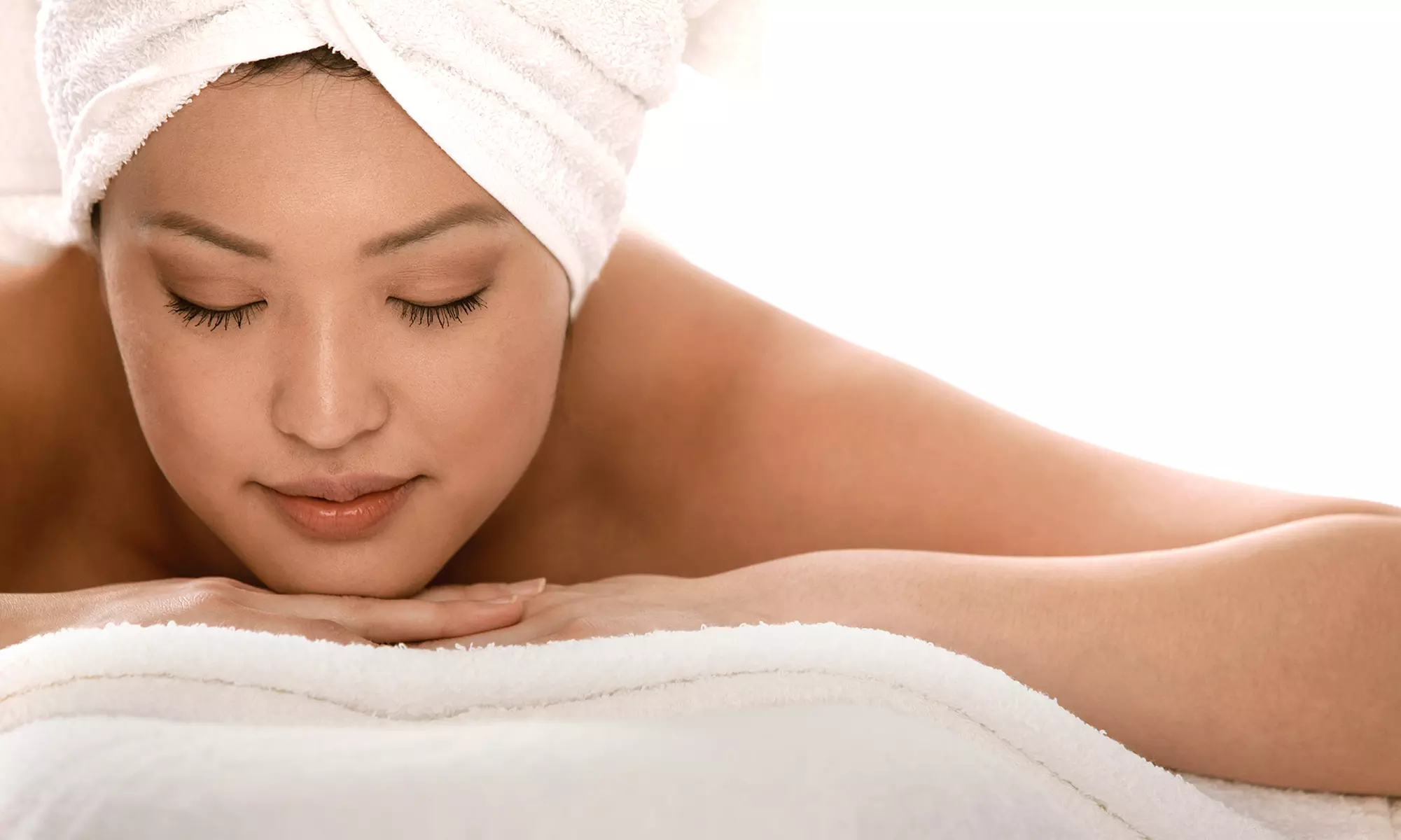 1 or 3 60- or 90-Minute Ashiatsu Massages or 4 Cuantic System Sessions at Soma Therapeutics (Up to 53% Off) - Primary Image