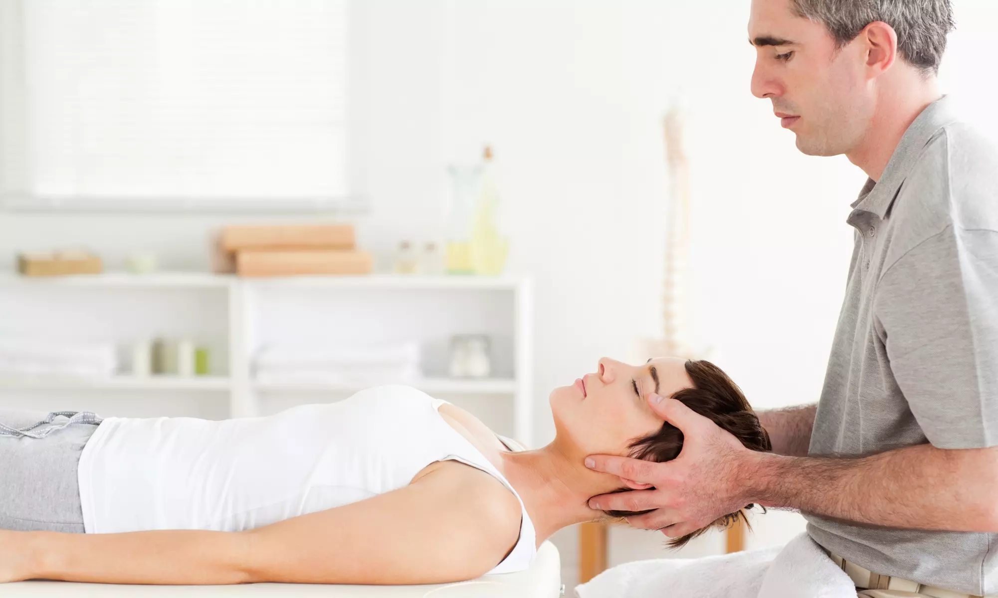 Chiropractic Exam, Therapeutic Session, and Two or Three Adjustments at Vita Chiropractic Clinic (Up to 88% Off)