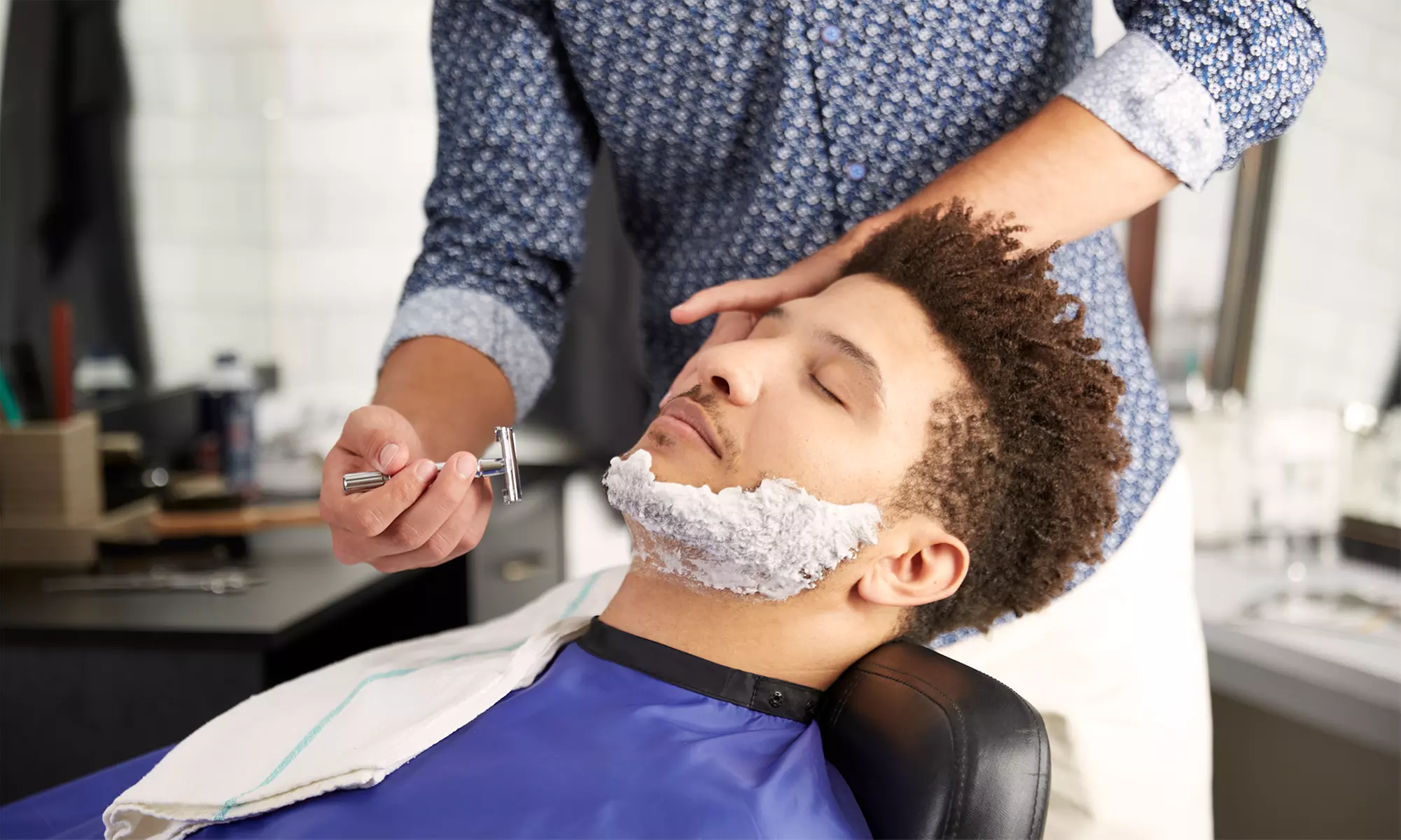 Men's Hot Shave, Men's-Only Facial, or Ear and Nose Wax at Kingsmen Haircuts for Men (Up to 60% Off) - Primary Image