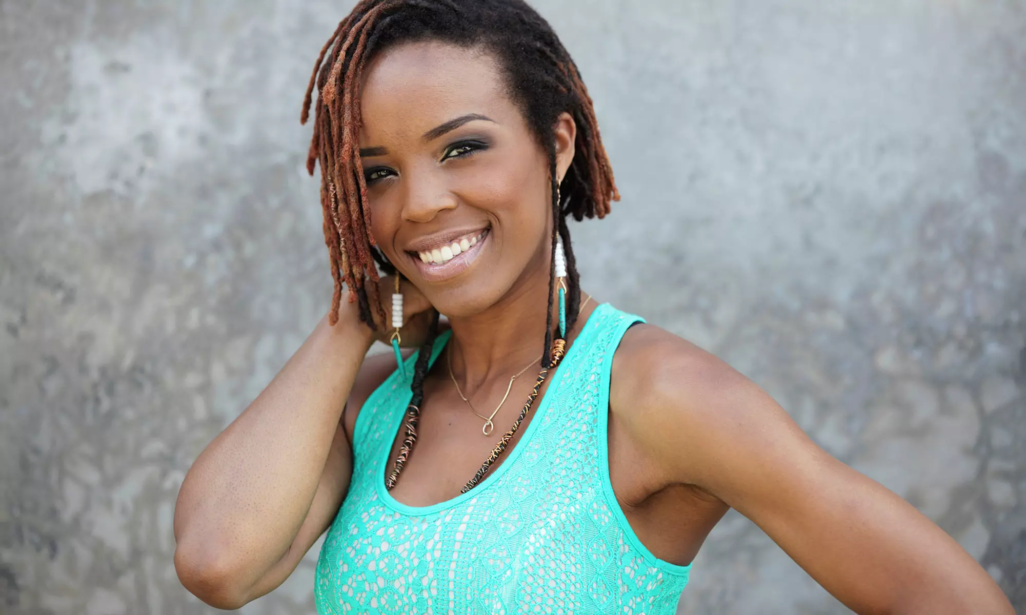 Starter Locs, Hair Trim, or Extensions at Melvin and Juanita's Multiculture Unisex Salon (Up to 62% Off) - Primary Image