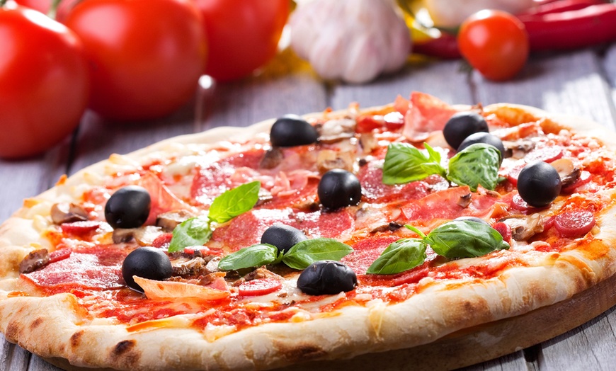 Image 1: Up to 57% Off on Pizza Place at Restaurant Hubert