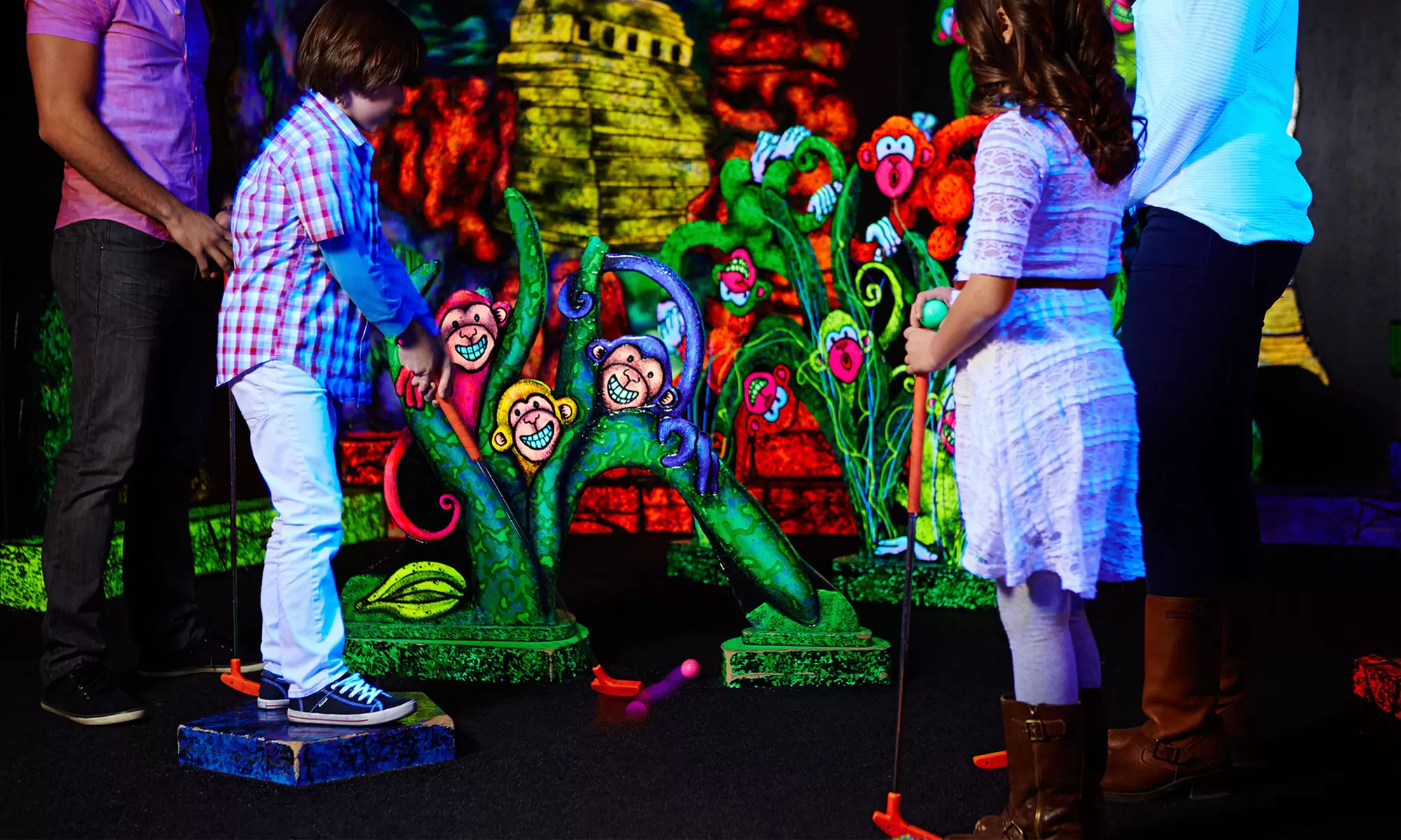 Glow-in-the-Dark Mini-Golf or Party Package for up to 10 at Rainforest Glow Golf (Up to 48% Off).  - Primary Image