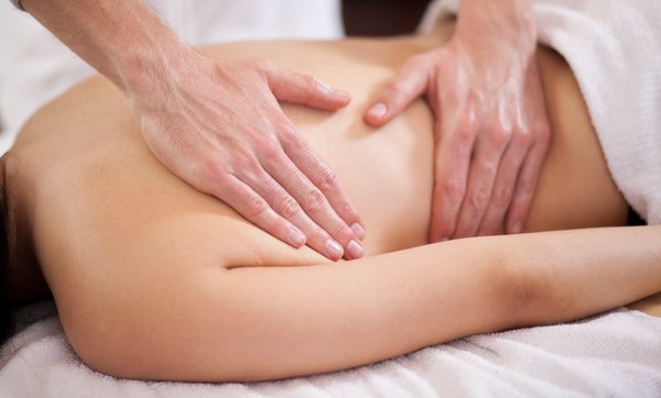 A serene spa setting with a massage table, ready for relaxation.