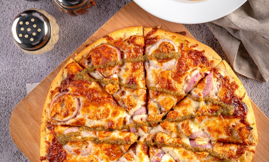 Image 1: Up to 45% Off on New American Cuisine at Shakey S Pizza Parlor