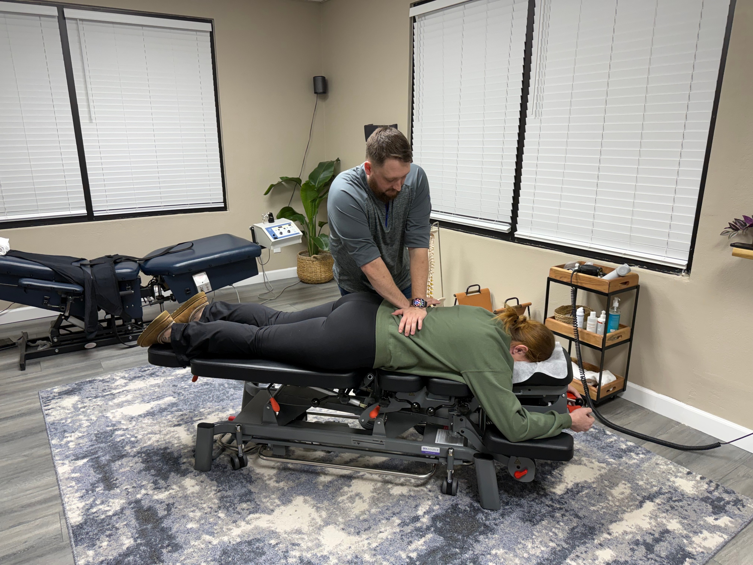 Consultation, Exam, Adjustments, Stretch and Laser or Decompression