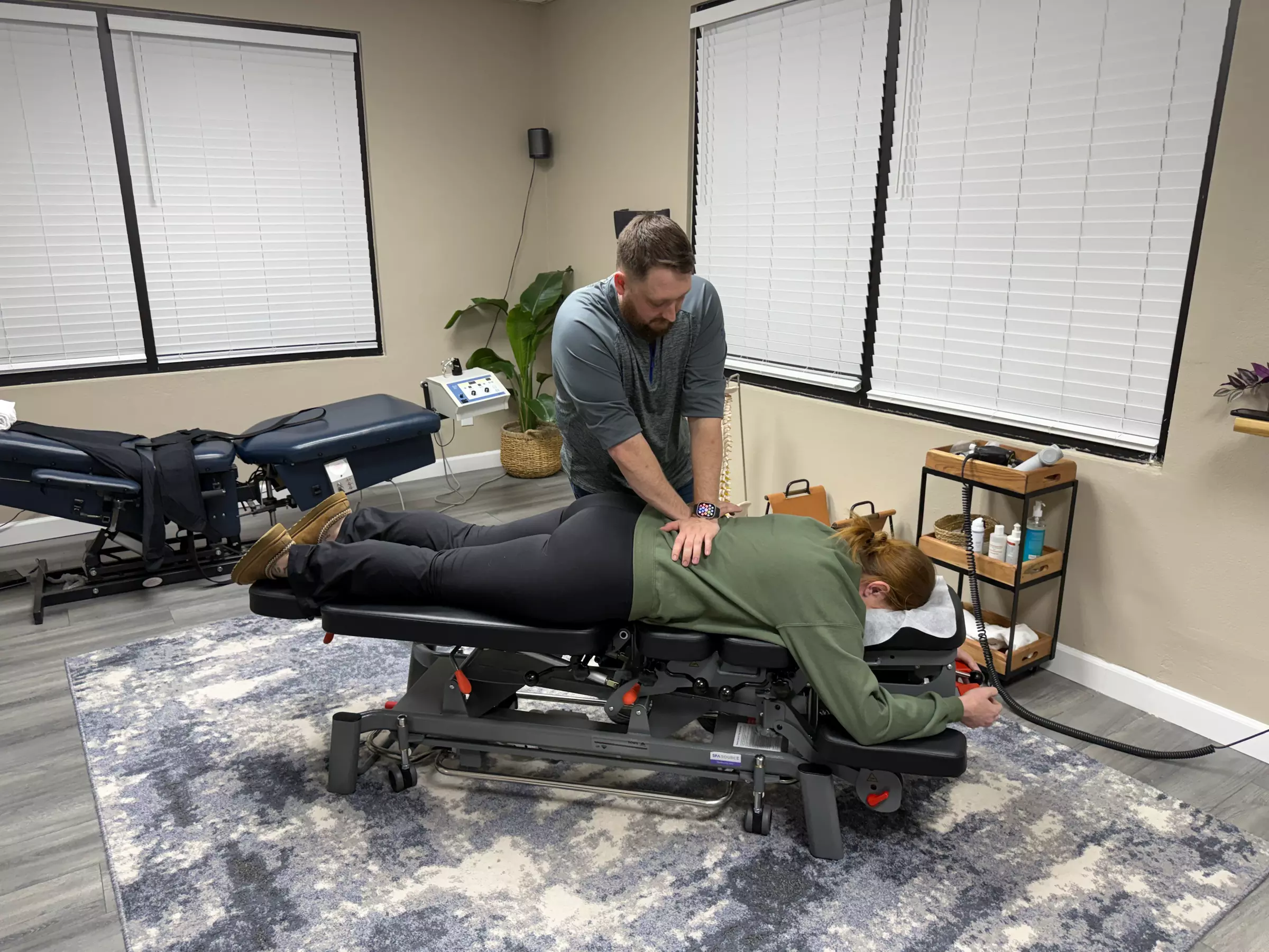 Consultation, Exam, Chiropractic Adjustments, 60-Min Stretch and Laser or Spinal Decompression ( Up to 80% Off ) - Primary Image