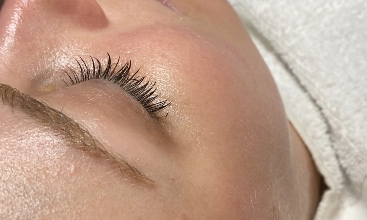 Brighten & Glow: Dermaplane + Hydration or 90-Minute Anti-Aging Treatment with 10-Minute Massage. Save Up to 45% - Primary Image