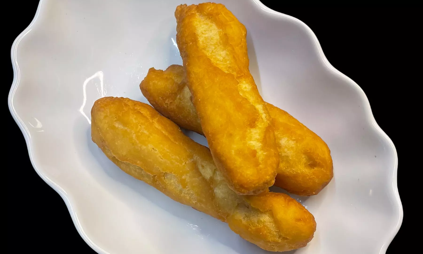 Up to 33% Off on Jamaican Cuisine at Tropics Jerk Center - Second Medium