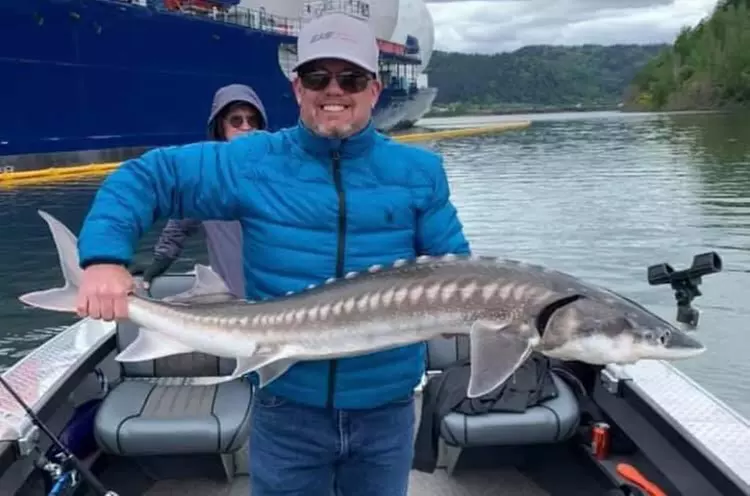 Unforgettable Fishing Adventure: Salmon or Steelhead Trip for Two or Four Anglers  - Second Medium