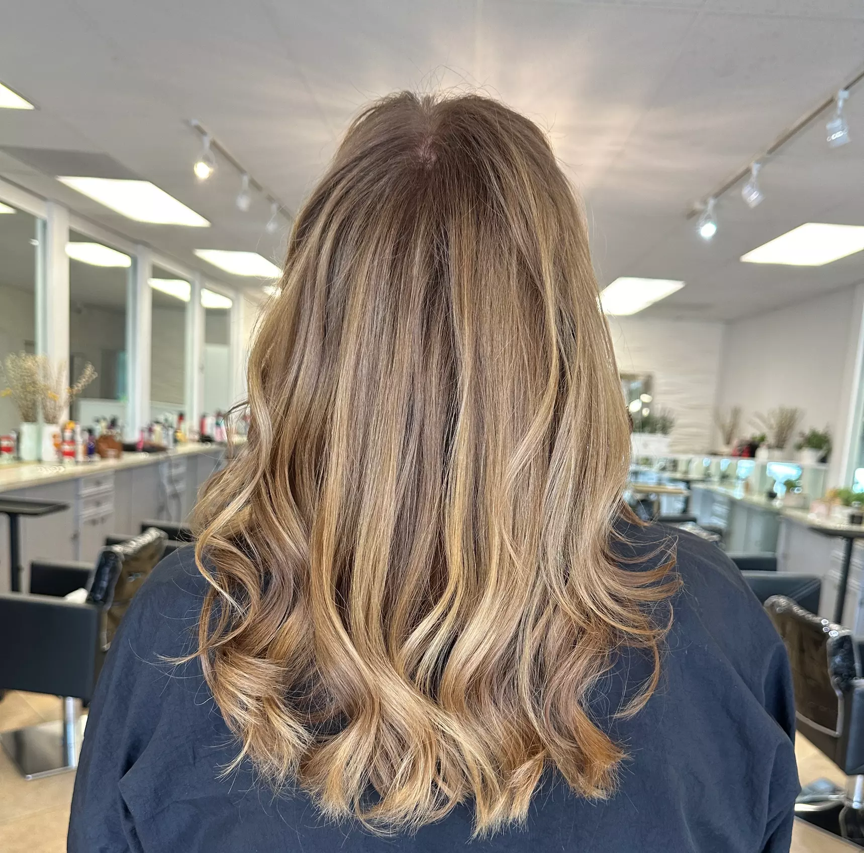 Experience a Women's Haircut with Free Deep Conditioning & Styling at Hair by Fay, enjoy up to 50% off your next visit - Primary Image