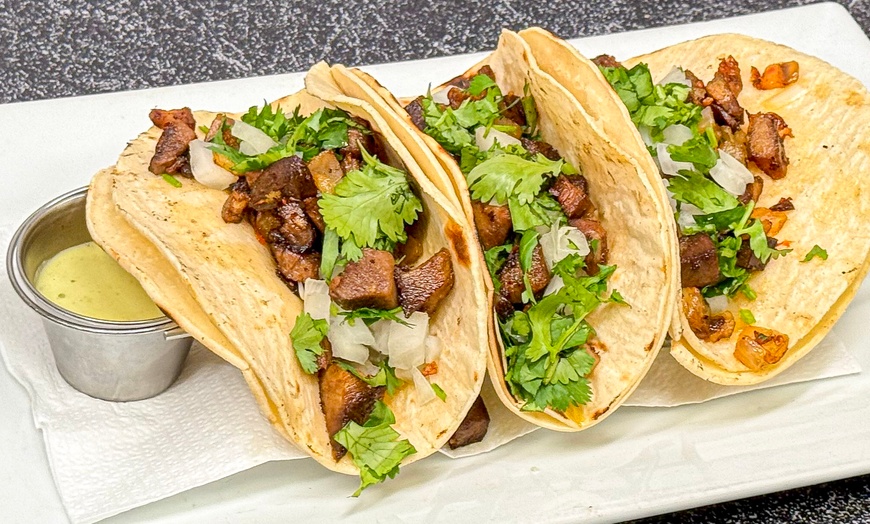 Image 7: Enjoy American-Colombian Dishes with Up to $150 Towards Food & Drinks