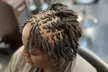 Revitalize with Retwist, Loc detox, Starter locs, and Free style at Melodic Roots & Wellness (Up to 48% Off) - Second Medium