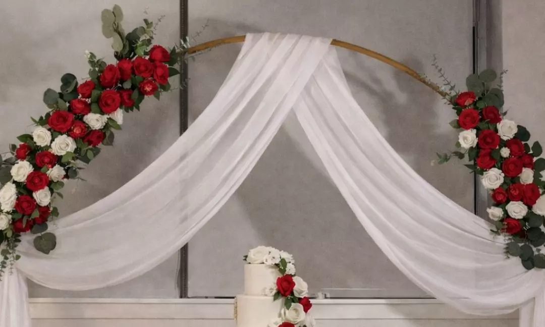 Elevate Your Event w/ a Floral Arch with Roses & Draping Fabric & More