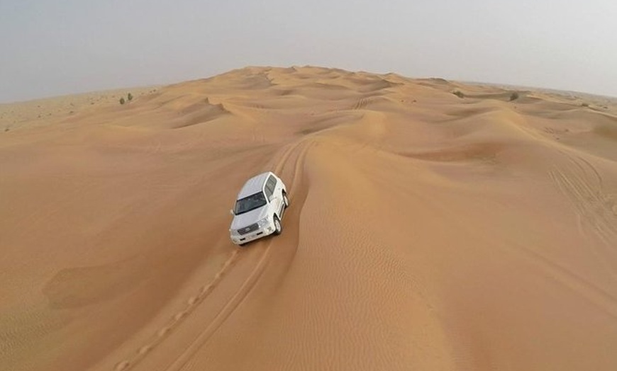 Image 1: Desert Safari + 30 minutes Quad bike with 4x4 Home Pickup