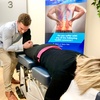 Image 3: Initial Consultation, Exam, and Adjustment by Qualified Chiropractors 