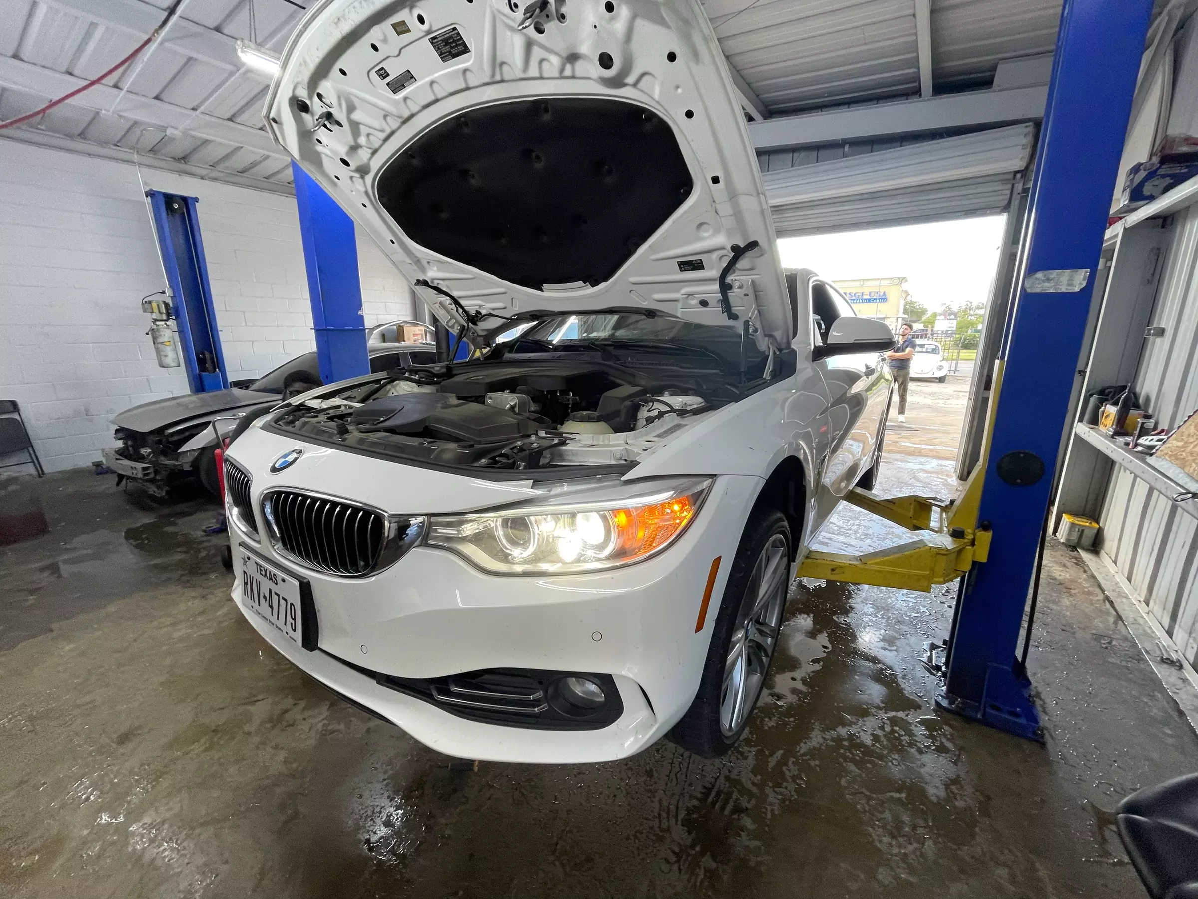 Experience BLVD Auto Service Center's oil change options with up to 55% off, including conventional and synthetic choices. - Primary Image