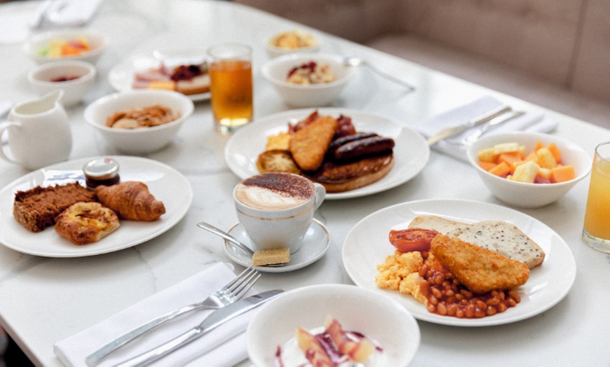 Image 1: Buffet Breakfast and Parking for Up To Three Adults at Dapl Restaurant