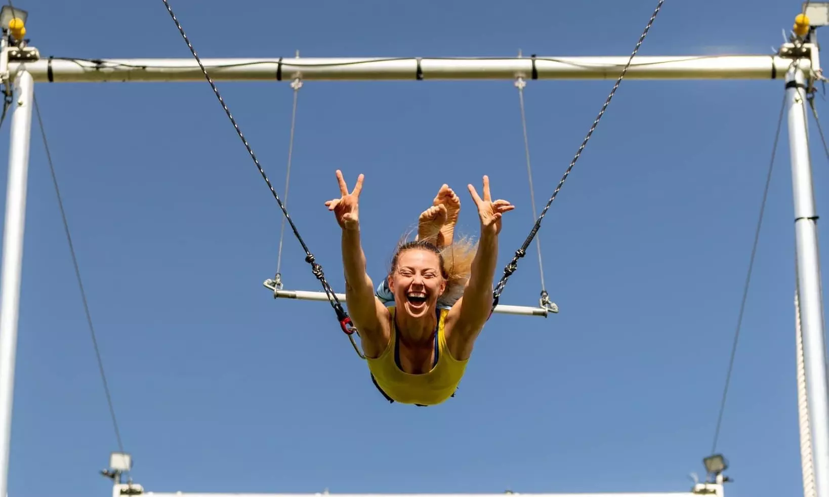 Join Texas Circus and Aerial for Flying Trapeze Classes or Private Parties with up to 25% off, offering a thrilling experience - Primary Image