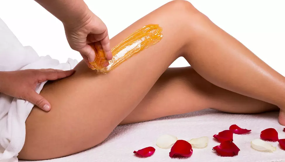 Achieve silky skin with Destiny Derma Spa's bikini and Brazilian sugaring, offering up to 55% off - Primary Image