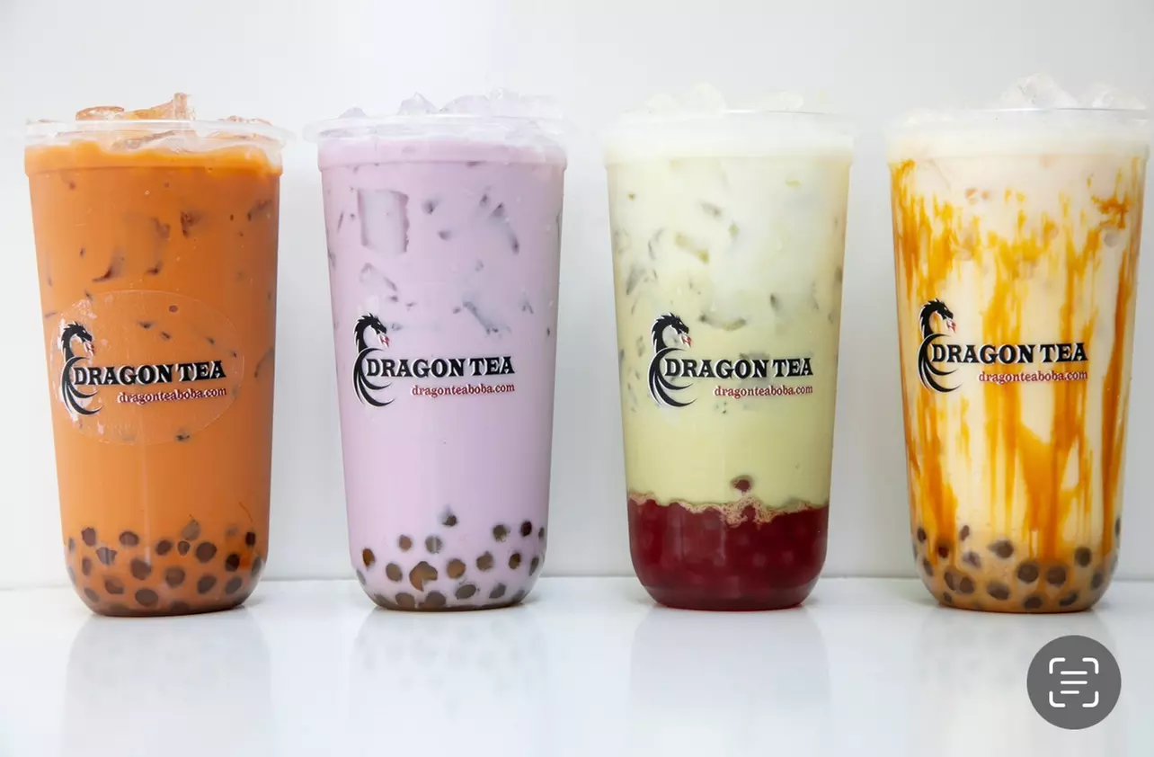 Dive into Dragon Tea's unique bubble tea experience with options of four or two vouchers, offering up to 10% off - Primary Image