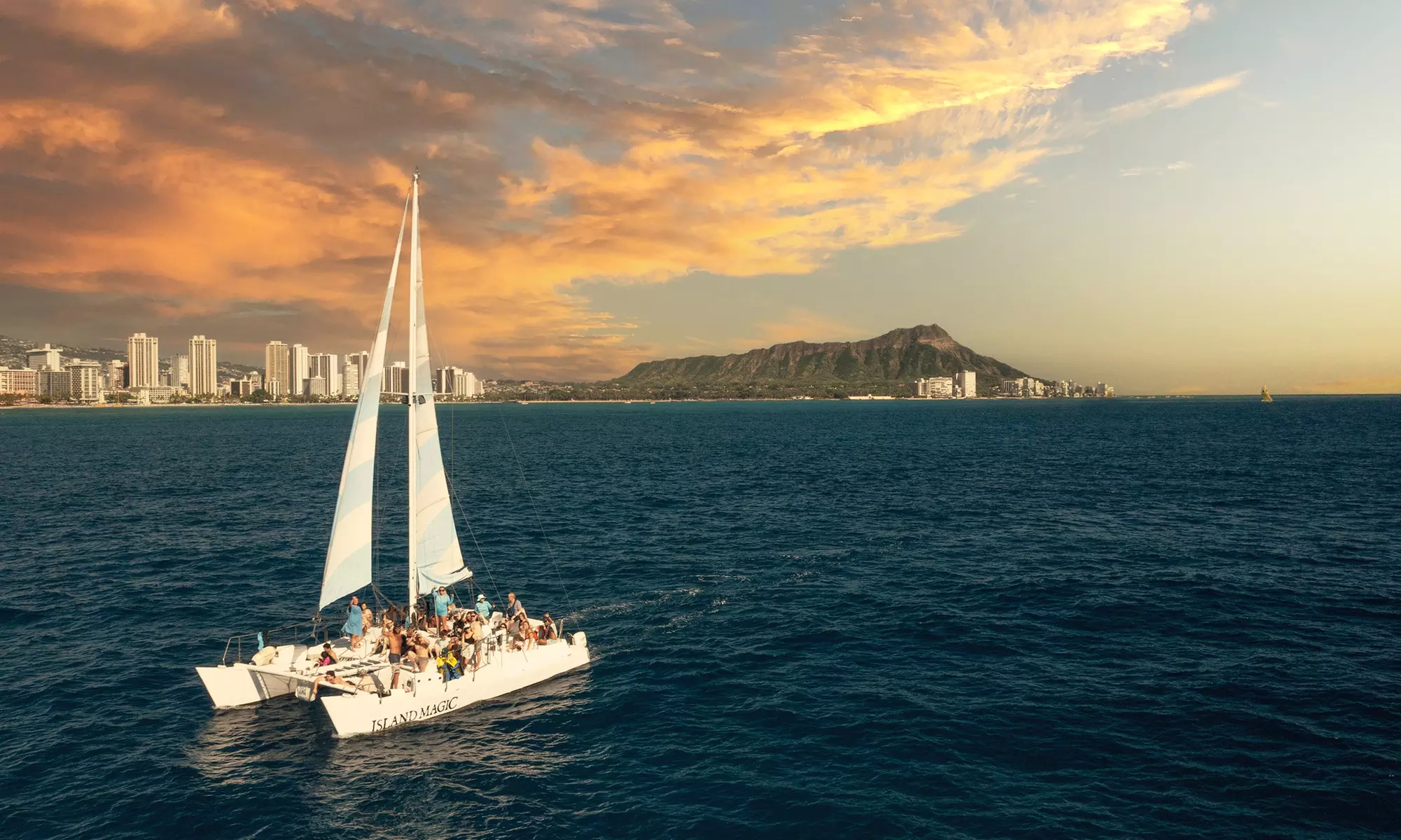 Up to 35%Off for 2-Hour Swim & Sunset Sail for One from Island Magic Charters LLC (Waikiki Adventure Sails)