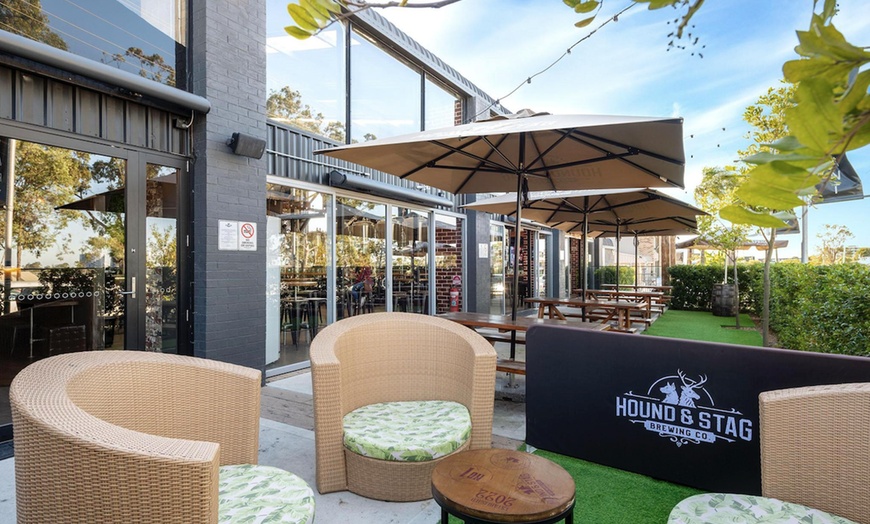 Image 4: Choice of Burger and Chips and Beer Paddle for Up to Four People