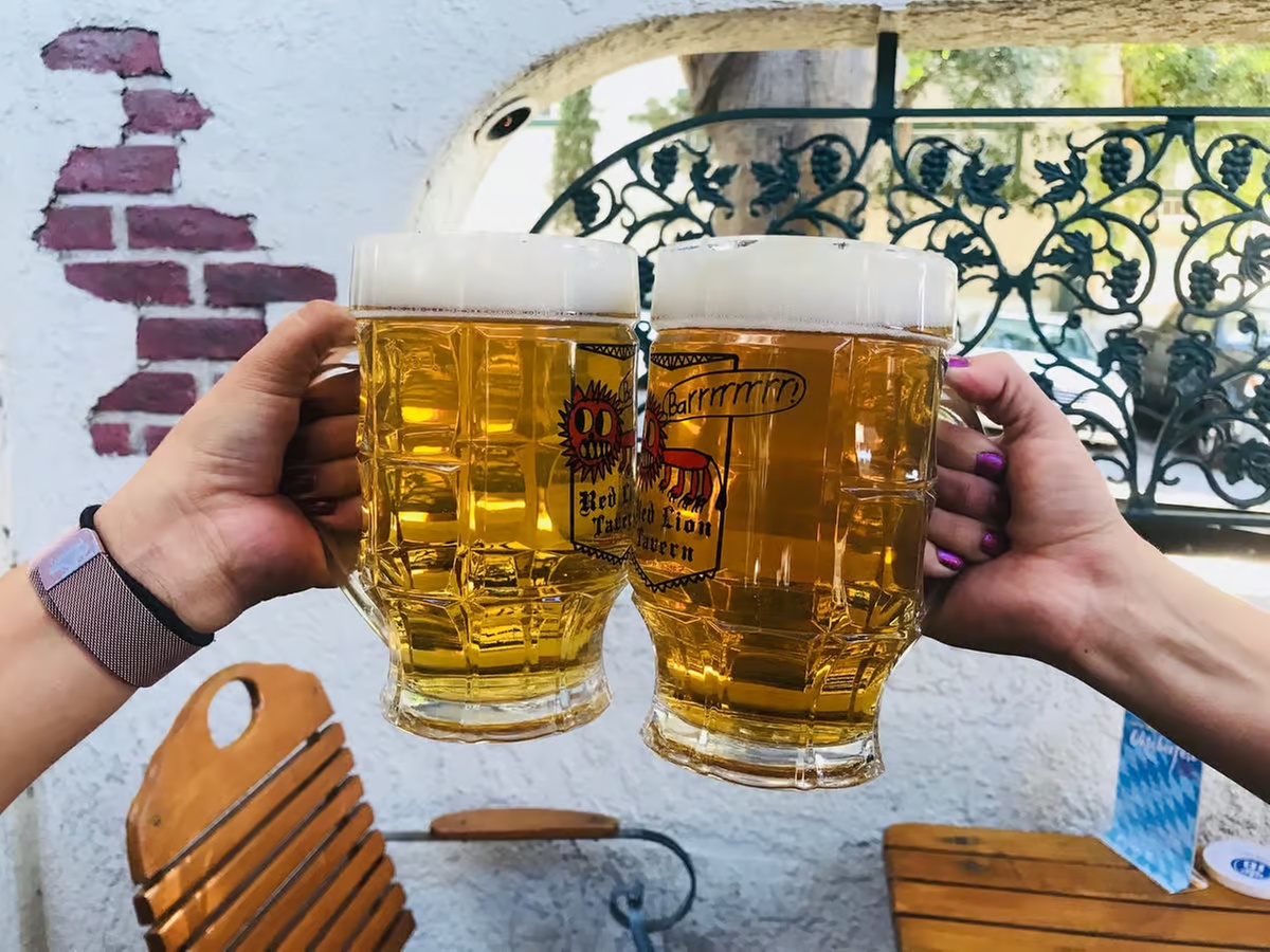 Experience Red Lion Tavern with Two Beers, Sausage Platter, or Ceramic Oktoberfest Beer Steins for up to 43% off