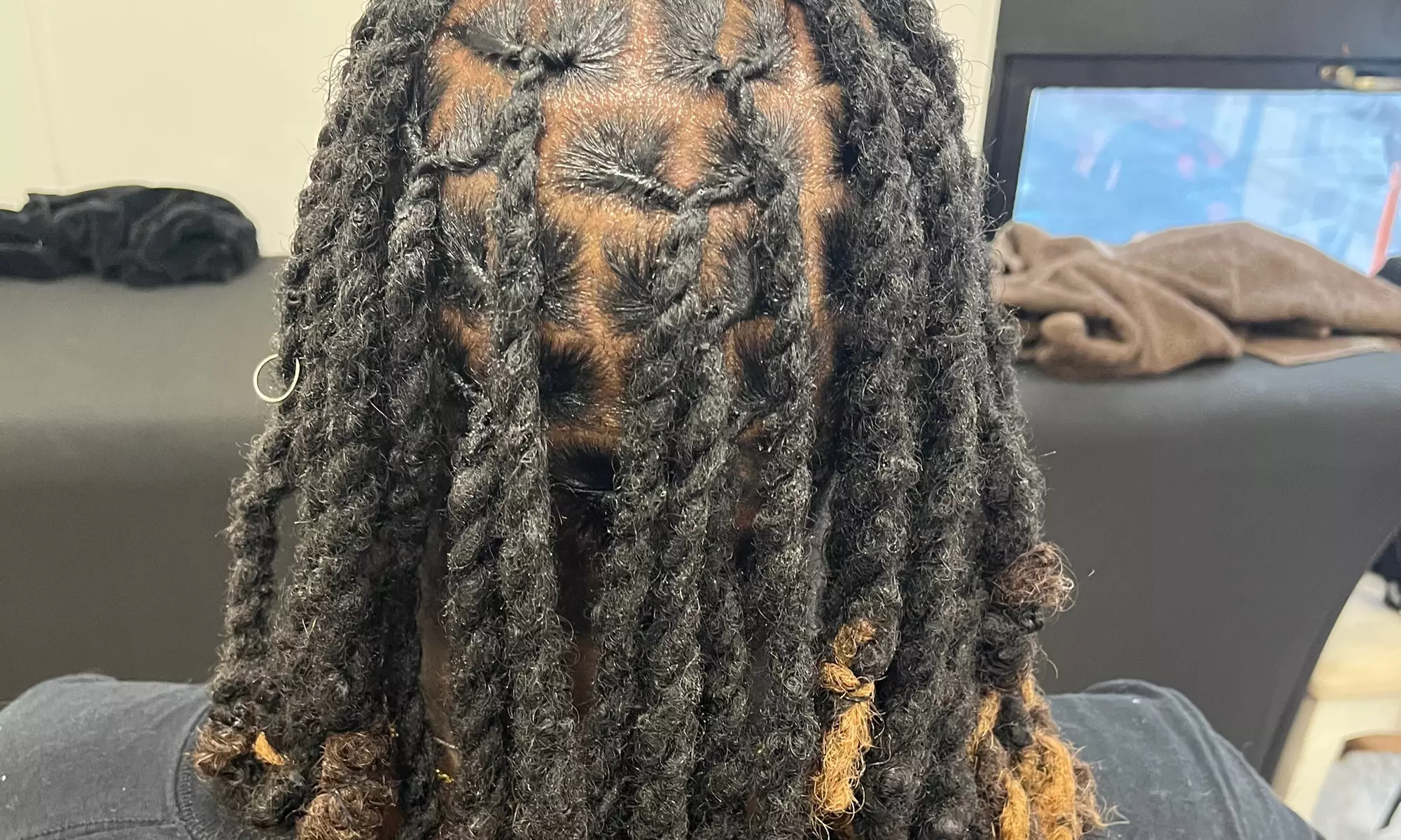 Get Fresh Loc Maintenance with Wash and Re-Twist Options