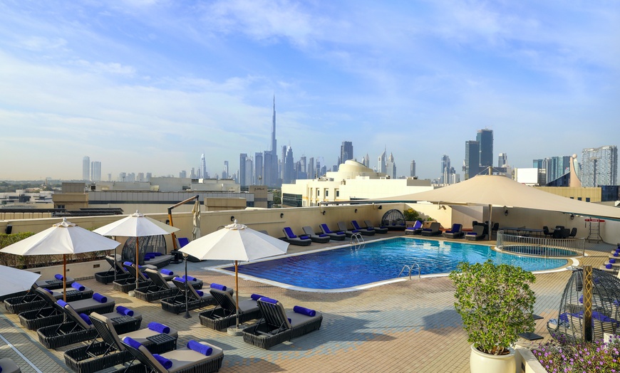 Image 1: 5* Pool Access with Food Credit: Child AED 39, Adult AED 69