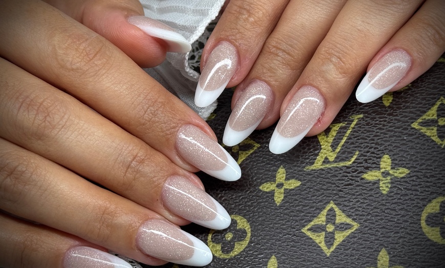 Image 1: Up to 43% Off on Mani-Pedi - Shellac / No-Chip / Gel at Aurora