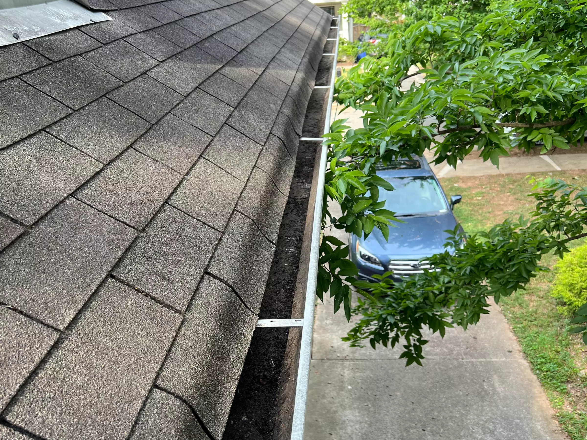 Up to 50% Off on professional gutter cleaning services for a spotless roof and gutters at Metro Atlanta Lawn care - Second Medium