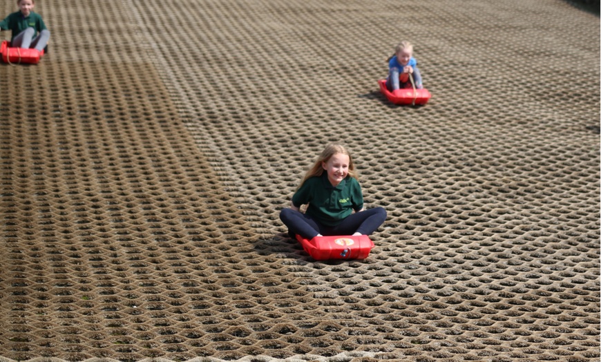 Image 1: 30-Minute Tobogganing Pass for Up to Six Children