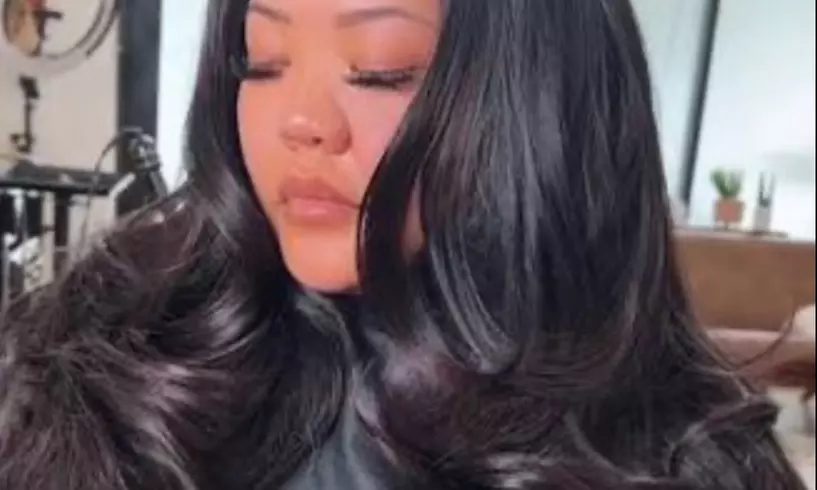 Silk Press with Trim or Tape-in or Microlinks Extensions at The Beautii Bar Salon & Boutique (Up to 46% Off) - Second Medium