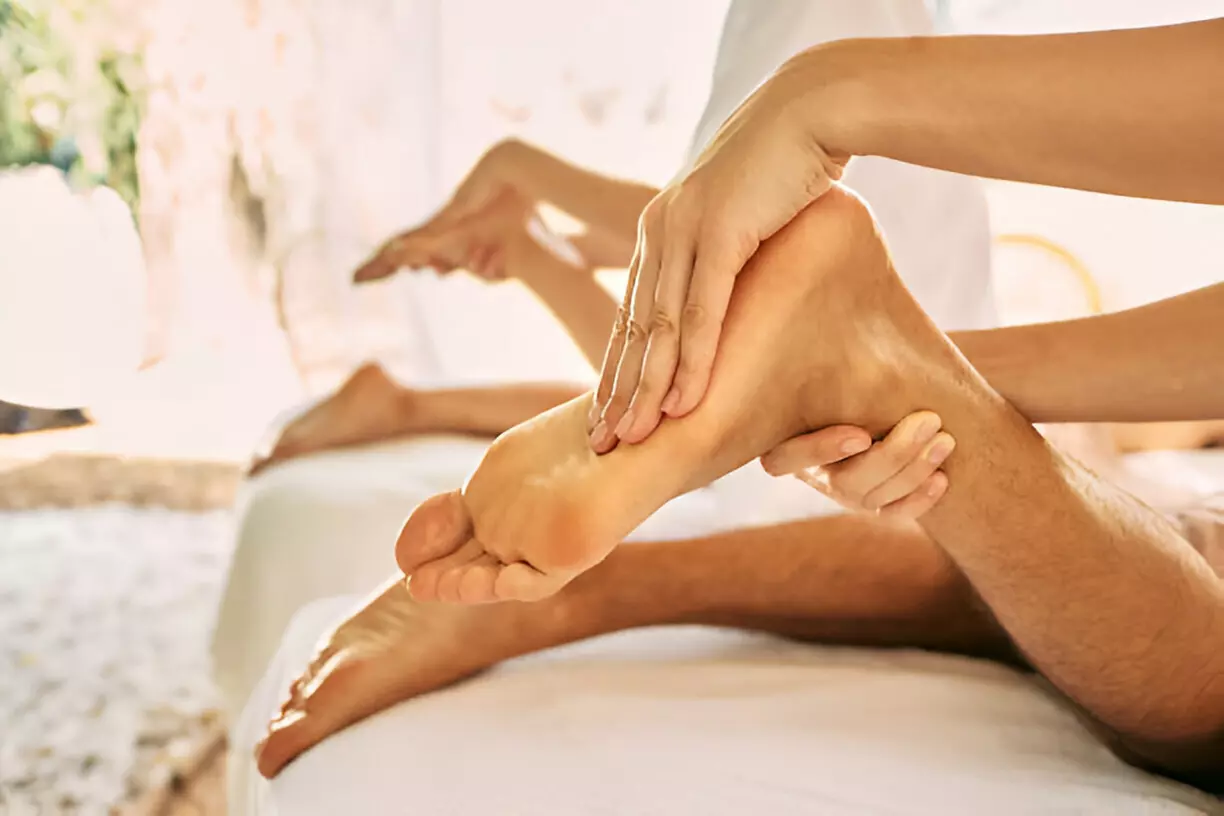 Feel the bliss at Massage FE with a 60-minute Four Hands Asian massage session offering up to 54% off. - Primary Image
