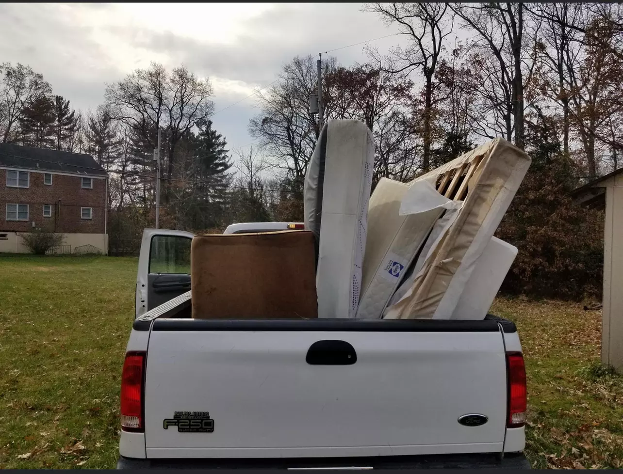 Junk removal with 8ft truck bed and trailer for full loads