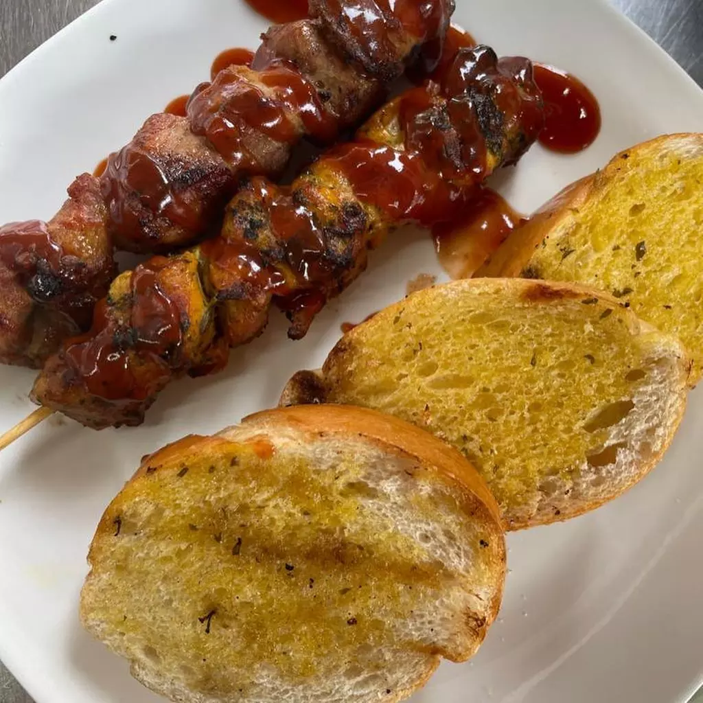 Up to 21% Off on Caribbean Cuisine at Yoyos Pinchos Tampa - Second Medium
