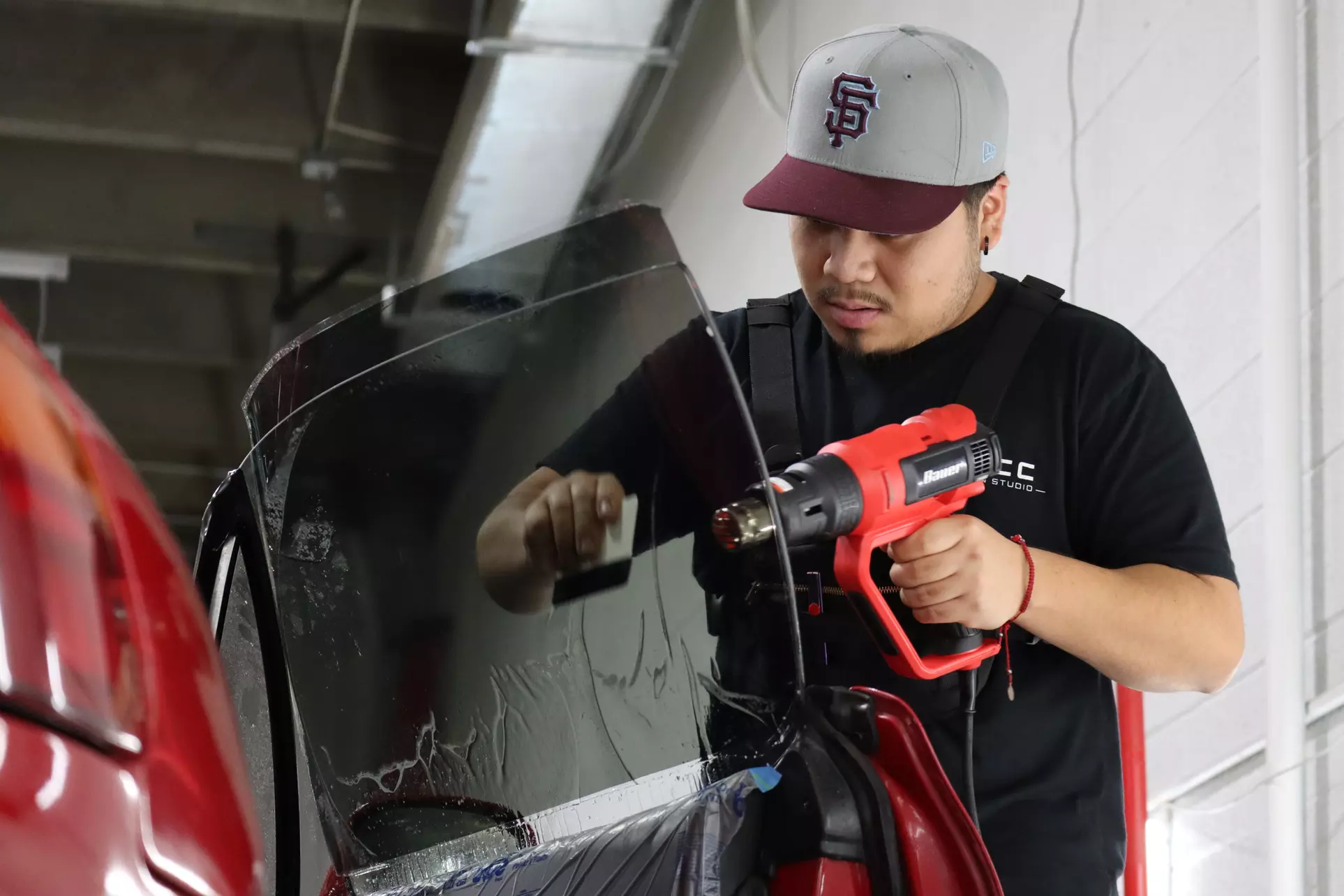 Logicc Protection Studio offers window tinting for two windows with up to 20% off, enhancing driving comfort and safety. - Primary Image