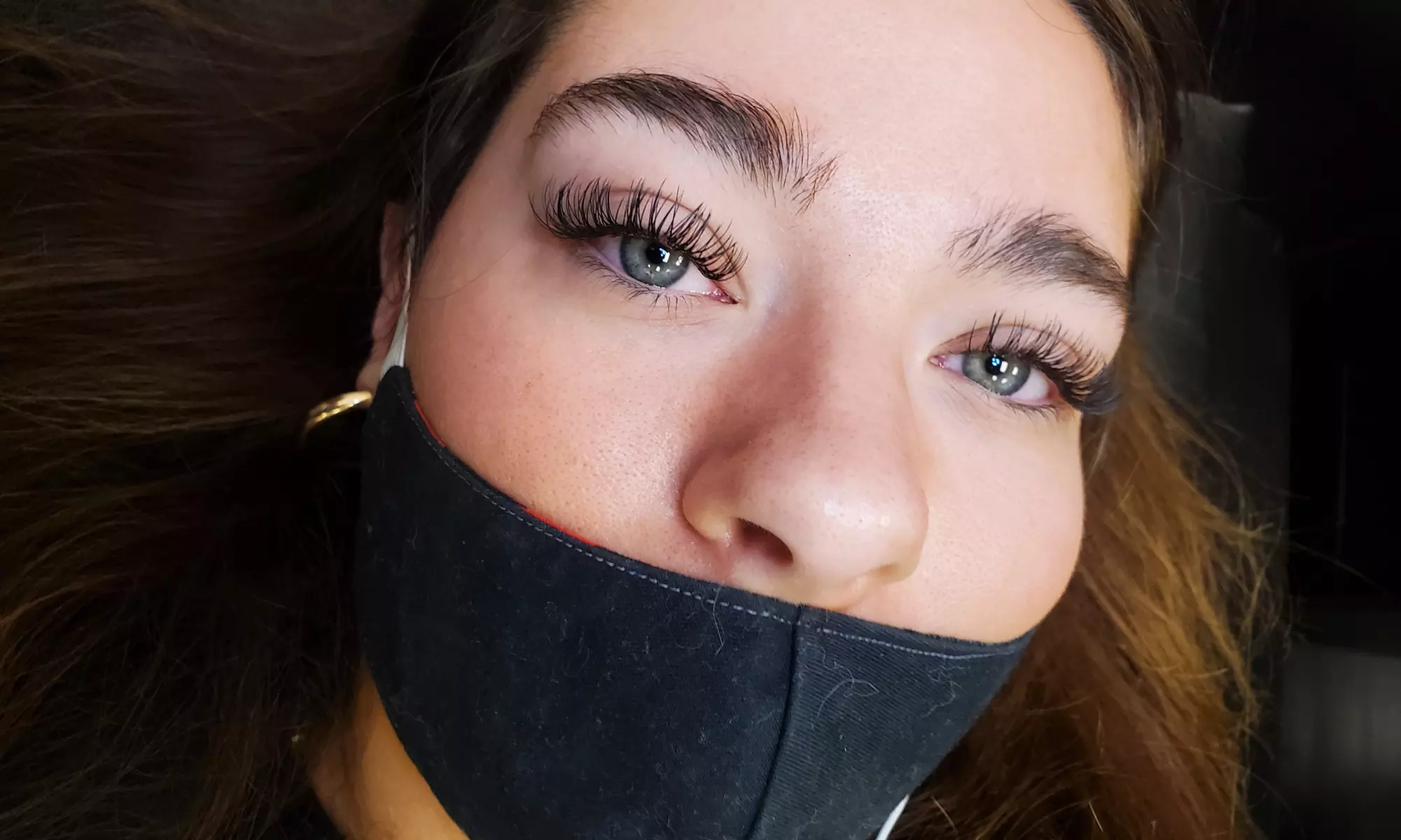 Transform your look with Eyeconic Beauty LLC's diverse eyelash extensions, including classic fill within 2 weeks, offering up to 50% off. - Primary Image