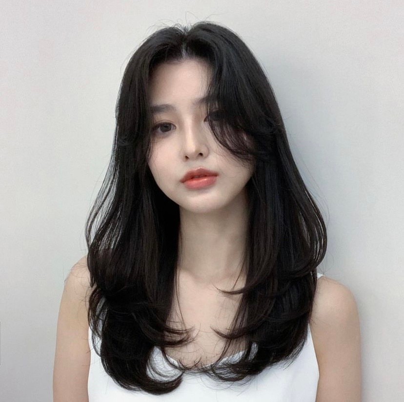 Women's haircut with shampoo, conditioner, and blow-dry